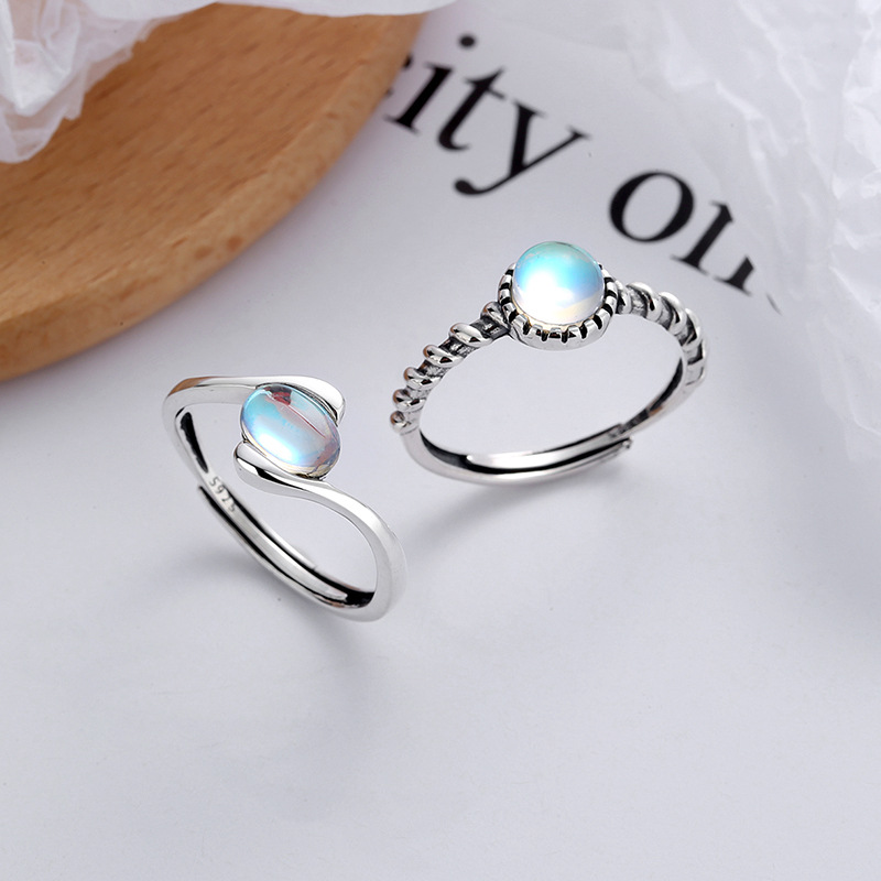 Second image of S925 sterling silver spiral band, blue gemstone, adjustable size ring for women.