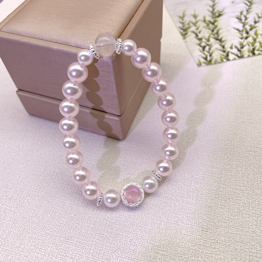 A delicate pink pearl bracelet for women subtle luxury and a refined style.