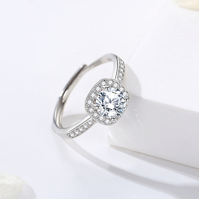 Classic, luxurious, and stylish square diamond ring with a 925 sterling silver setting.